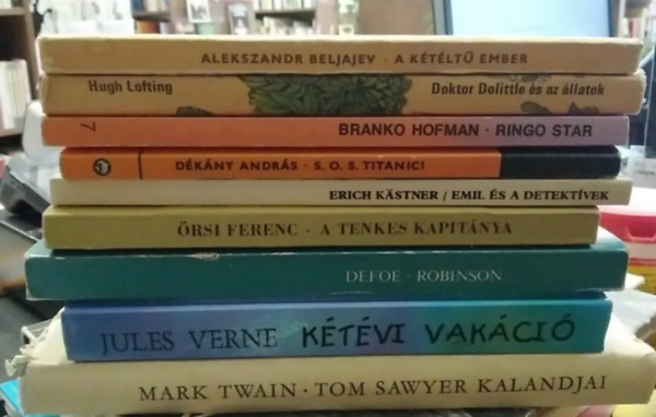 Alekszandr Beljajev, Hugh Lofting, Branko Hofman, D�k�ny Andr�s, Erich K�stner, �rsi Ferenc, Defoe, Jules Verne, Mark Twain - 9 db-os K�NYVMENT� AJ�NLAT, ifj�s�gi: A k�t�lt� ember+ Doktor Dolittle �s az �llatok+ Ringo Star+ S.O.S. Titanic!+ Emil �s a detekt�vek+ A Tenkes kapit�nya+ Robinson+ K�t�vi vak�ci�+ Tom Sawyer kalandjai