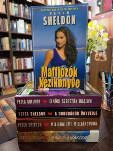Peter Sheldon - Peter Sheldon k�nyvcsomag 5 darabos K�NYVMENT� AJ�NLAT: Maffi�z�k k�zik�nyve, Eln�ki szeret�k uralma, A drogb�r�k �gyv�dje, Millenniumi milli�rdosok, Budai milli�rdosok V.