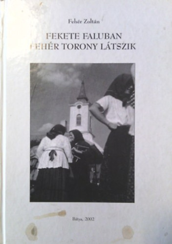 Fekete faluban feh�r torony l�tszik