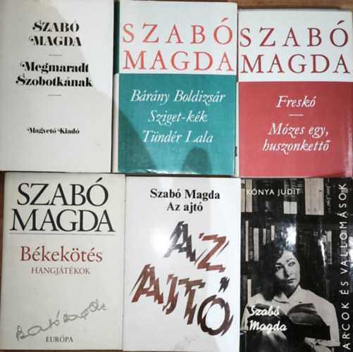Szab� Magda, K�nya Judit - 6db Szab� Magd�val kapcsolatos k�nyv (7 reg�ny 6 k�tetben)  - Szab� Magda-Megmaradt Szobotk�nak, H�rom reg�ny, Fresk�/M�zes egy, huszonkett�, B�kek�t�s, Az ajt�, K�nya Judit-Szab� Magda