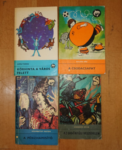 Eduard B�z, Heged�s G�za, Szombathy Viktor, Jurij Tomin - 4 klasszikus ifj�s�gi reg�ny a Delfin k�nyvek sorozatb�l: A csodacsapat, Az erd�nt�li veszedelem, A p�nzhamis�t�, K�rhinta a v�ros felett