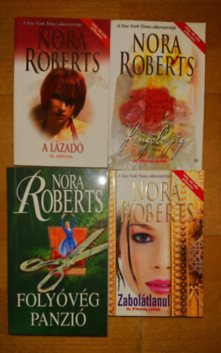 Nora Roberts - Nora Roberts 4 k�nyve: L�ngol� j�g, Zabol�tlanul, A l�zad�, Foly�v�g panzi�