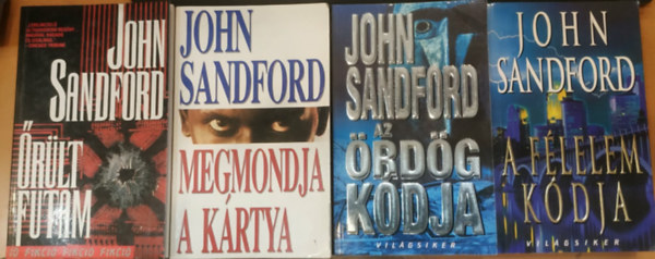 John Sandford - Kidd sorozat 1-4. (�r�lt futam, Megmondja a k�rtya, Az �rd�g k�dja, A f�lelem k�dja)