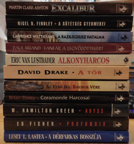 Martin Clark Ashton, Nigel  D. Findley, Lawrence Watt-Evans, Paul Briand, Eric Van Lustbader, David Drake, Brian Daley, W. Hamilton Green, Ed Fisher, Lesly L. Lastex, William Buxton - 11 db Fantasy kaland: Excalibur; A sttsg gyermekei; A baziliszkusz hatalma; Fanfr a legyzttekrt; Alkonyharcos; A tr; Az els jel: Baldur vre; Coramonde Harcosai; Abyss; Profundis; A drfarkas bosszja